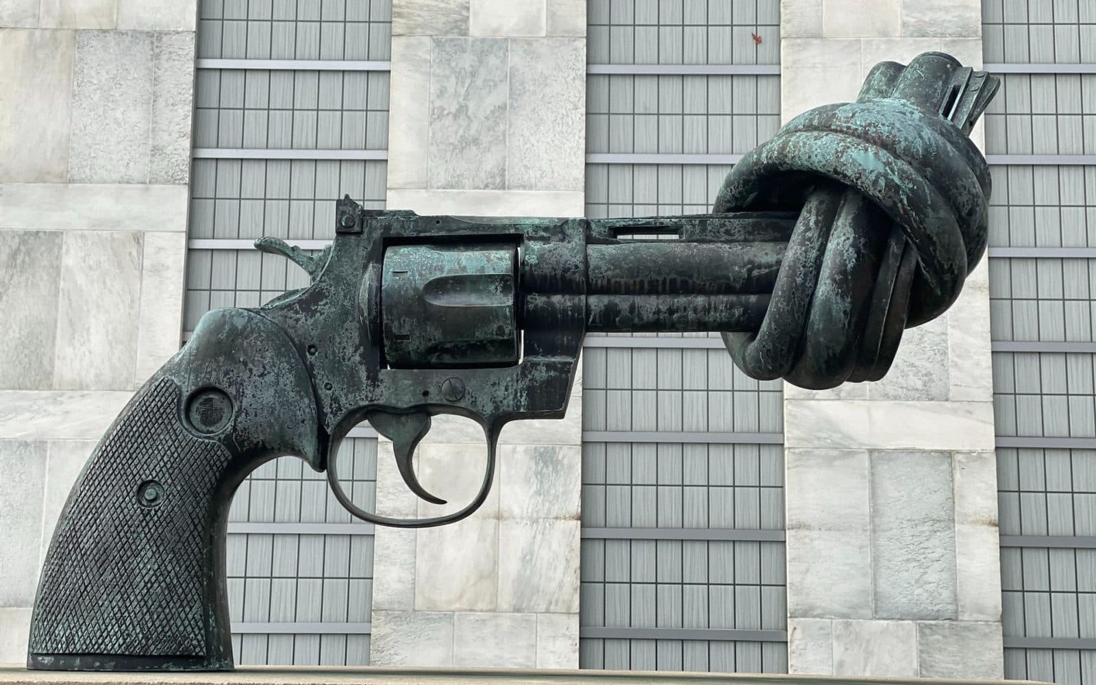 sculpture of a gun tied at the end